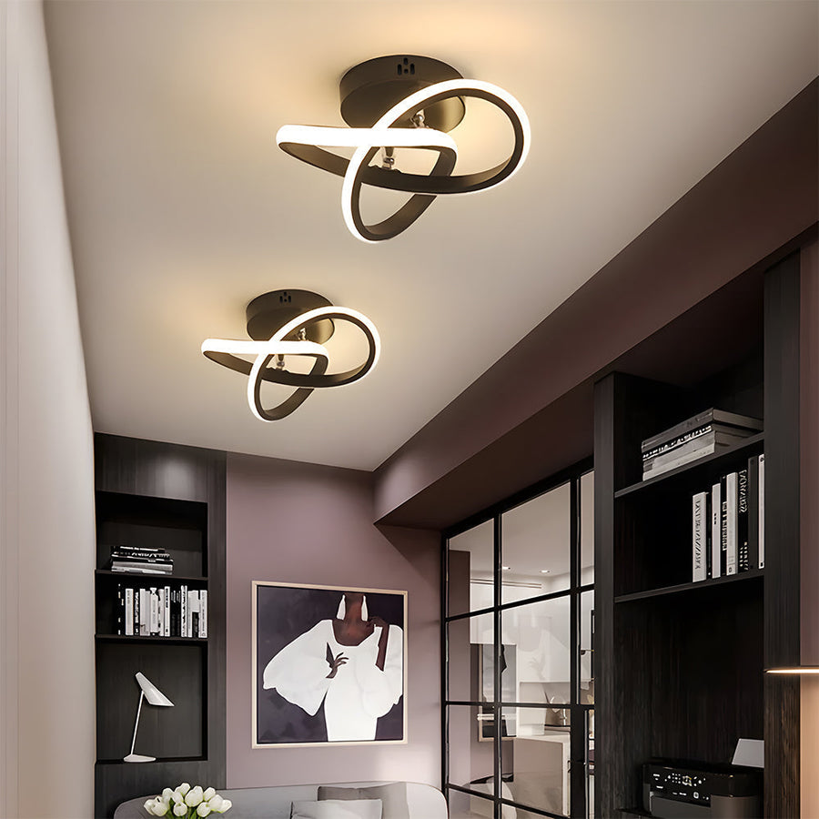 Modern geometric LED ceiling light in bedroom setting
