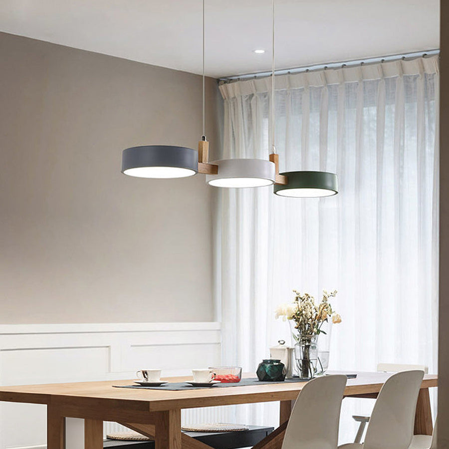 Pendant light shown in white, gray, and green finishes