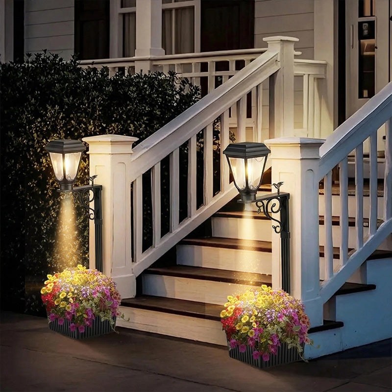 Solar lamp with planter insert placed on a front porch