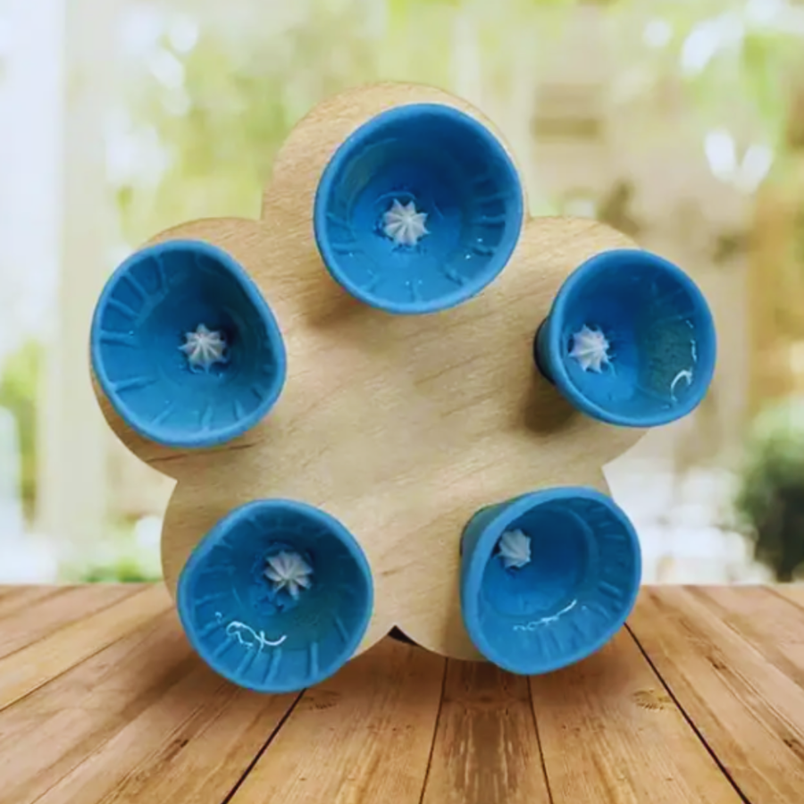 BeeCups displayed on a wooden garden stand
