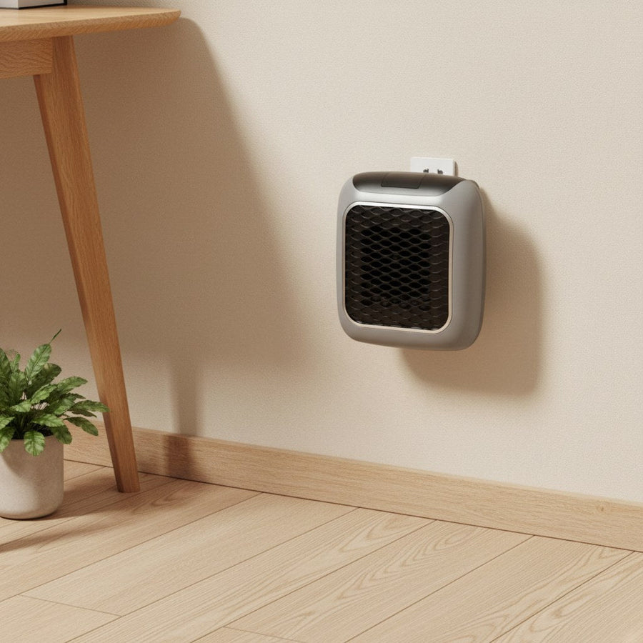Portable heater plugged in at a home office setup