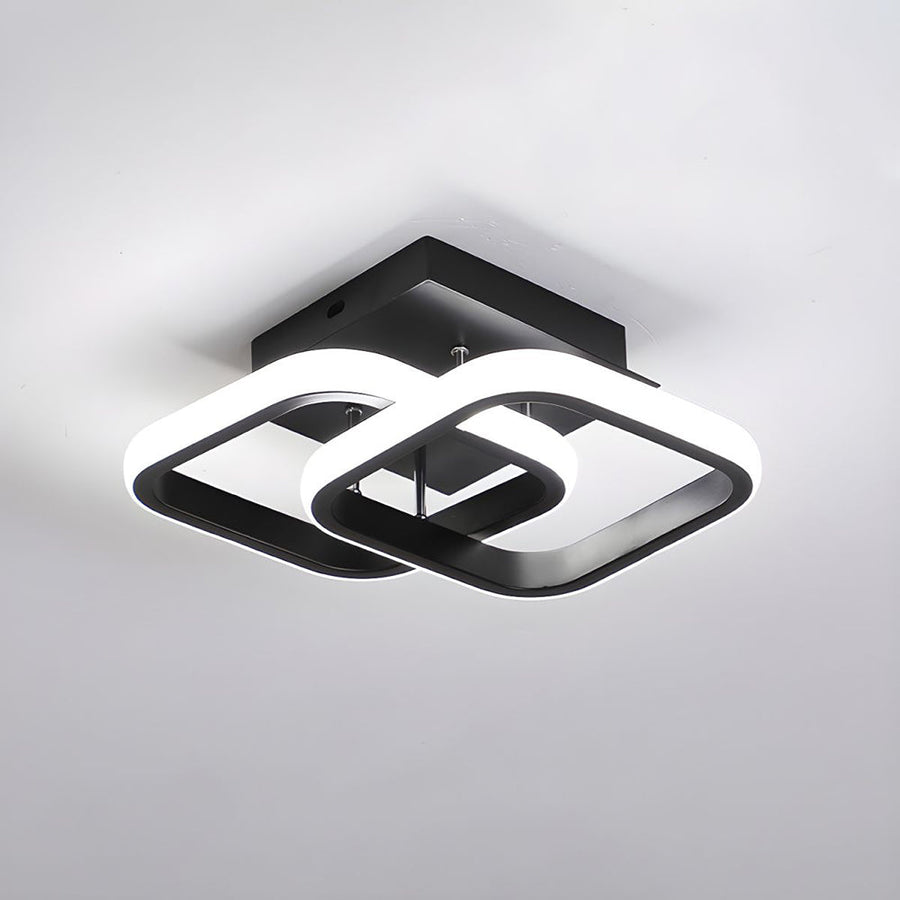 Modern geometric LED ceiling light glowing warm light