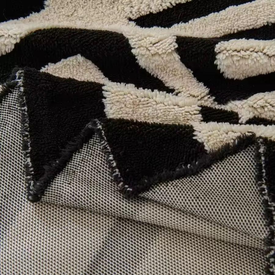 Full view of the knit sofa cover on a sofa