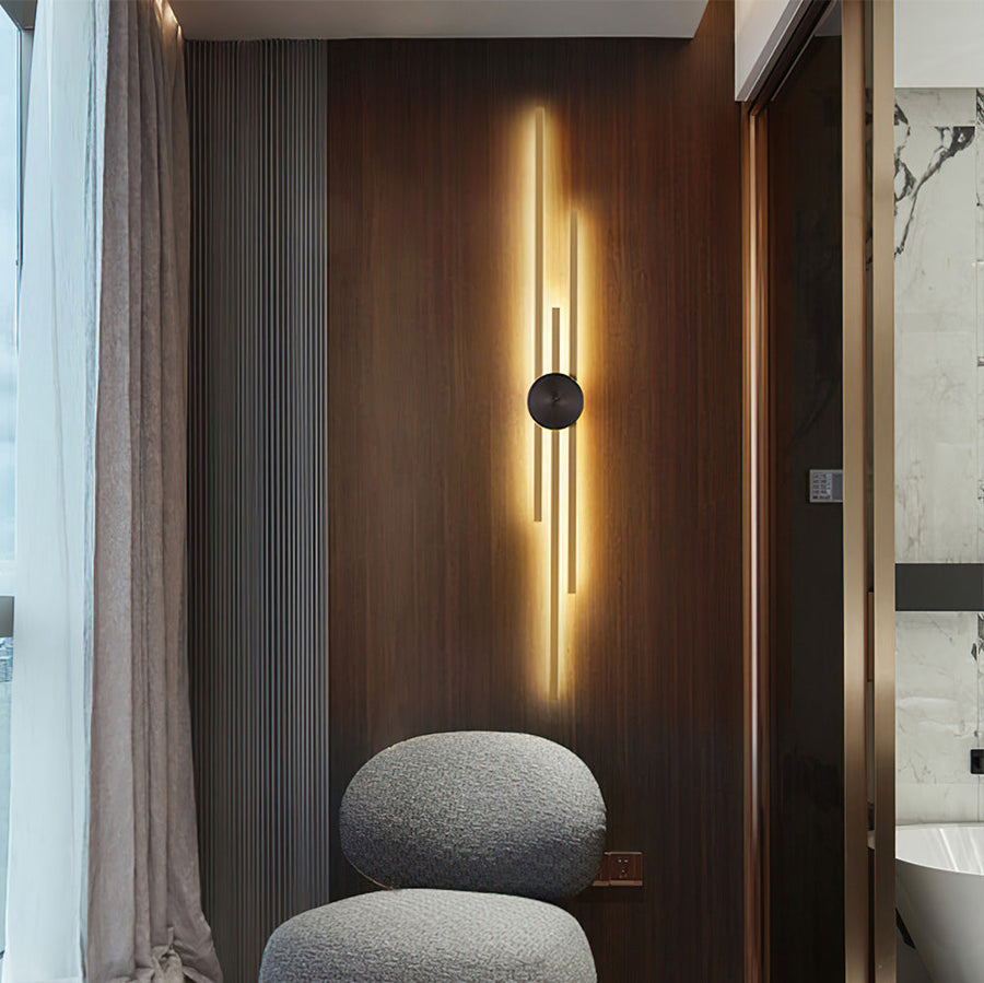 Front view of the black and gold linear wall lamp
