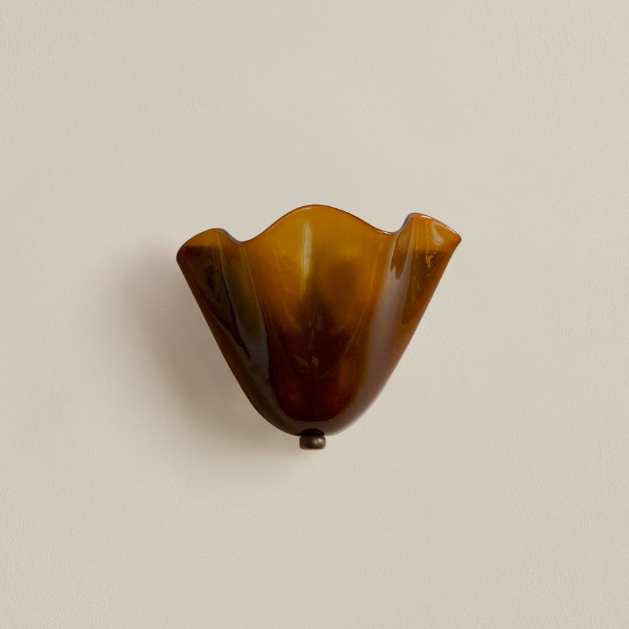 Close-up of the shell-shaped LED wall lamp texture