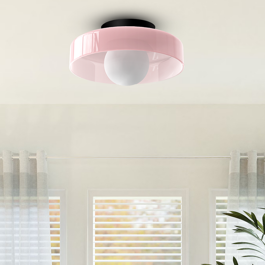 Minimalist LED flush mount ceiling light shown in pink finish
