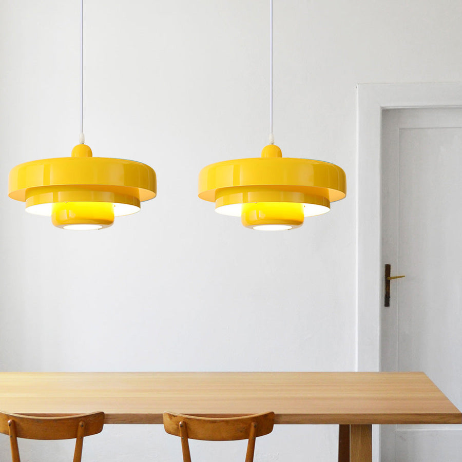 Pendant light hanging above a reading nook