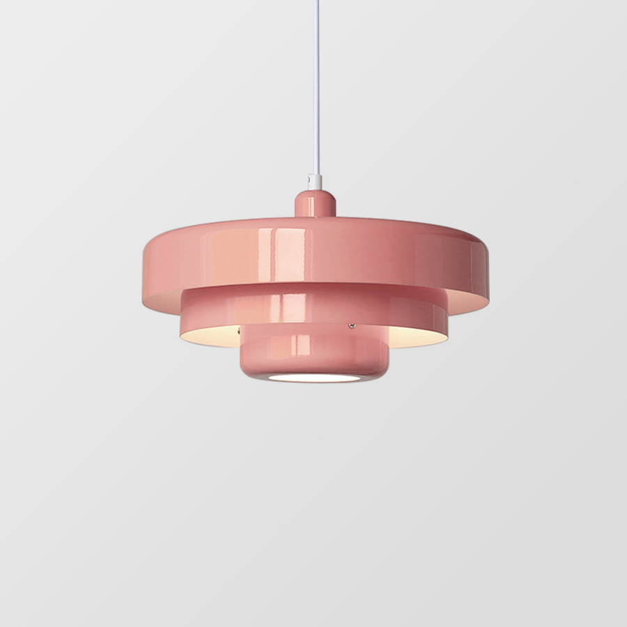 Orange retro pendant light against a white wall