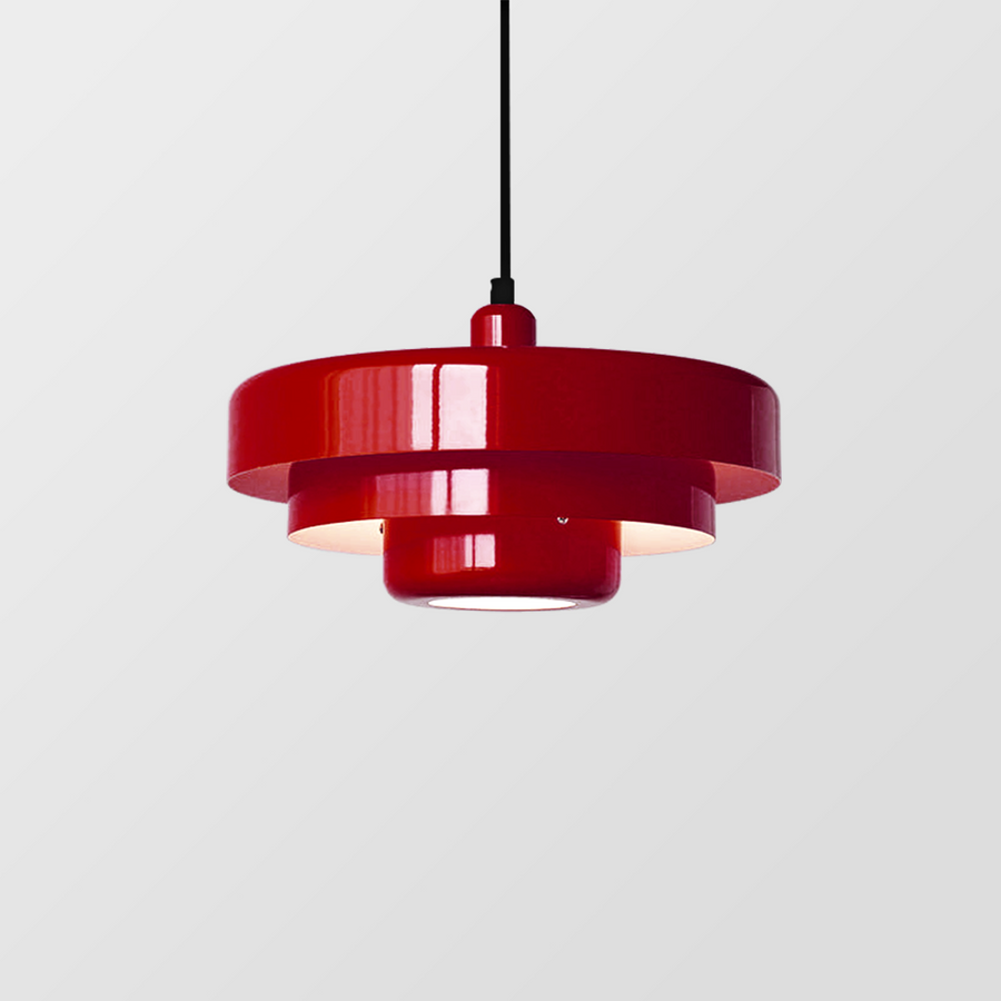 Yellow retro pendant light hanging near a window