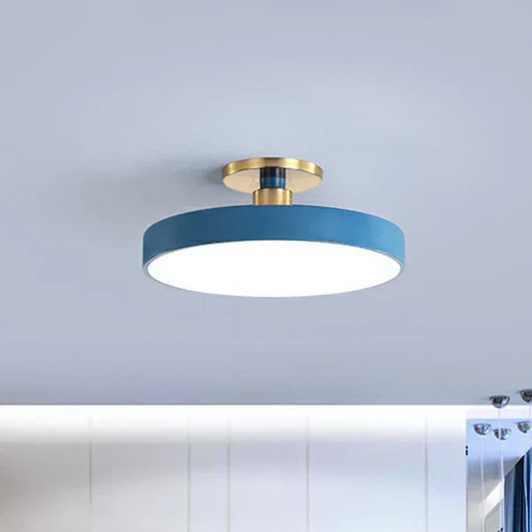 Ceiling light installed above a bed for ambient lighting