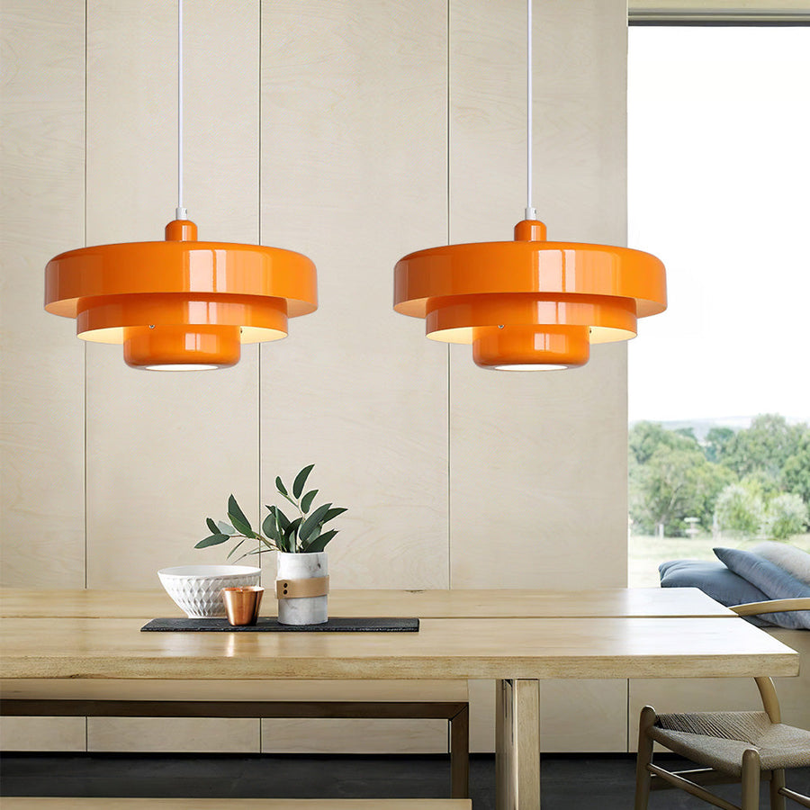 Red retro pendant light in a kitchen setting
