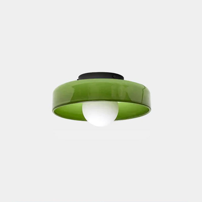 Minimalist LED flush mount ceiling light glowing with warm white light
