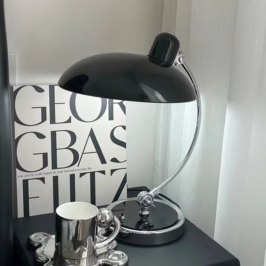 Lamp in white finish next to a reading chair