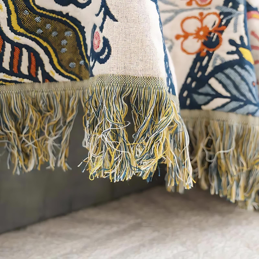 Rustic boho patterned throw blanket on a bed