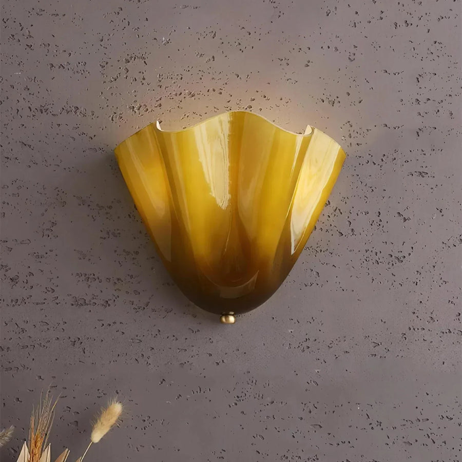 Wall lamp glowing with neutral white light in a bedroom