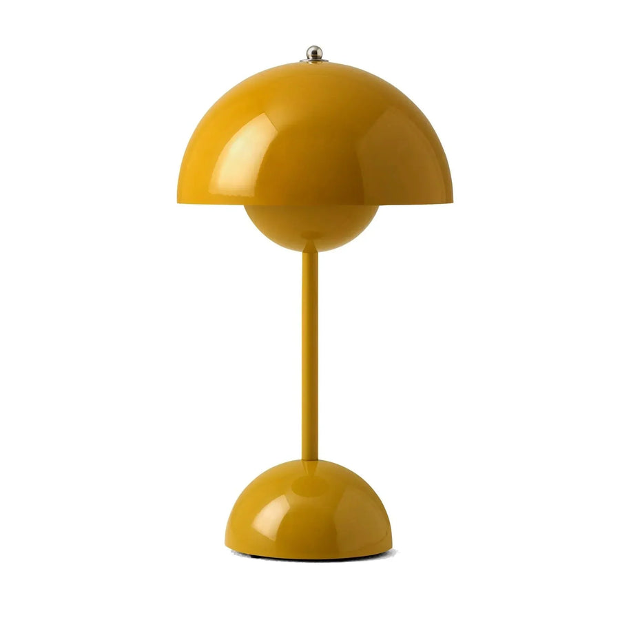 Minimalist table lamp glowing with warm white light