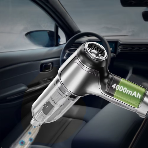 Cordless handheld car vacuum in use in a car