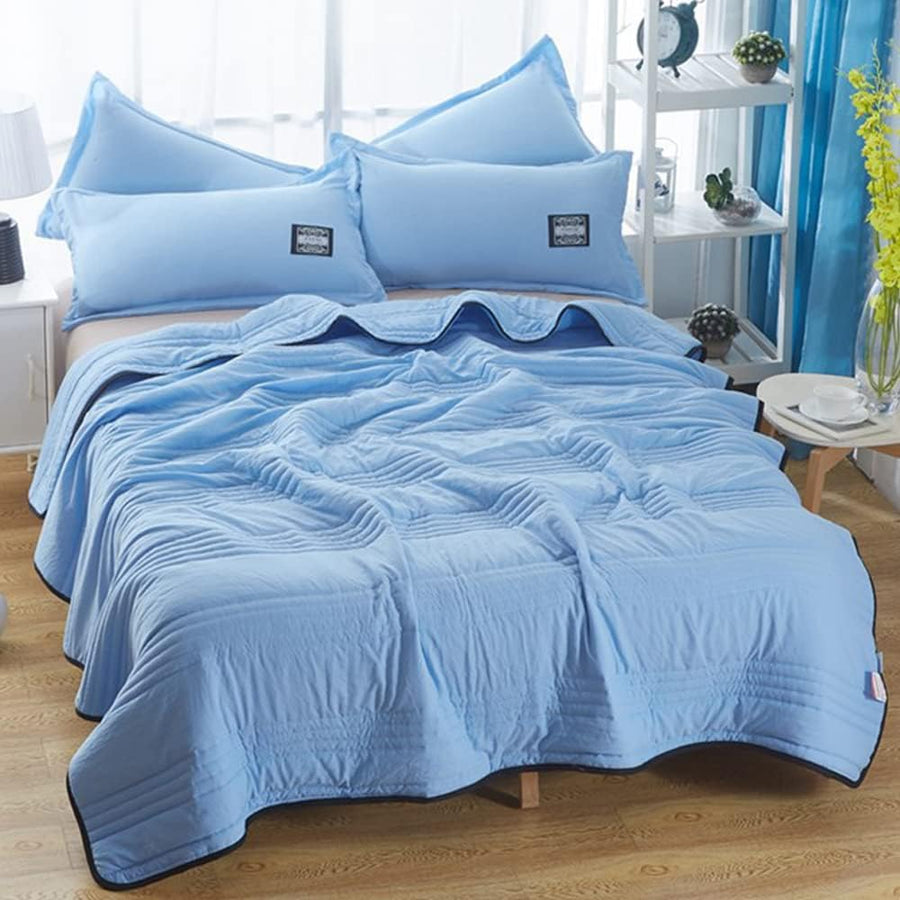 Cooling blanket styled on a living room chair