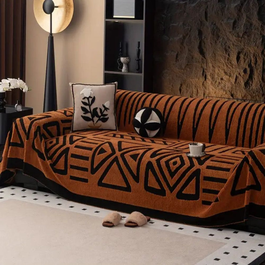 Sofa cover draped over an armchair