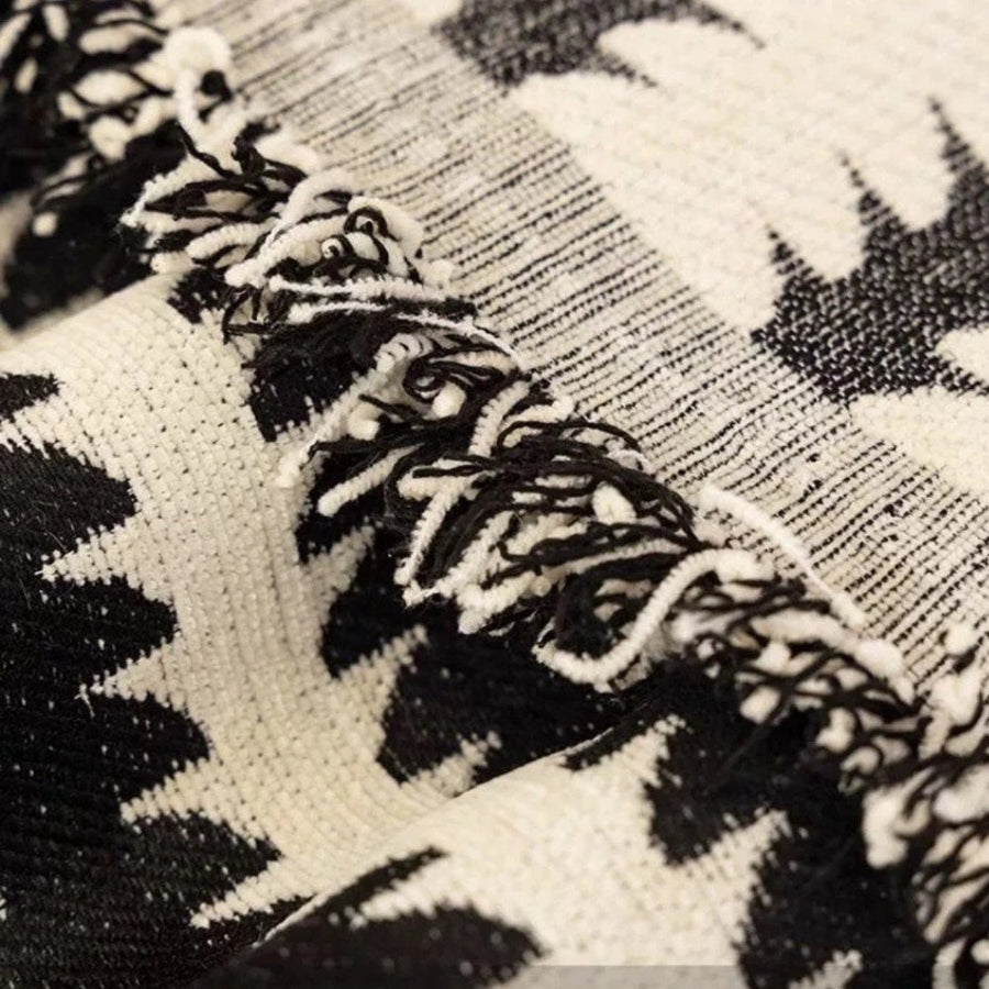 Sofa cover displayed alone against a plain background