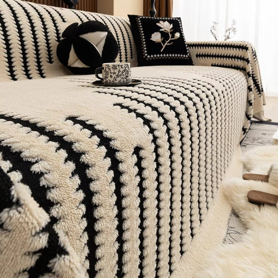 Sofa cover draped over an armchair