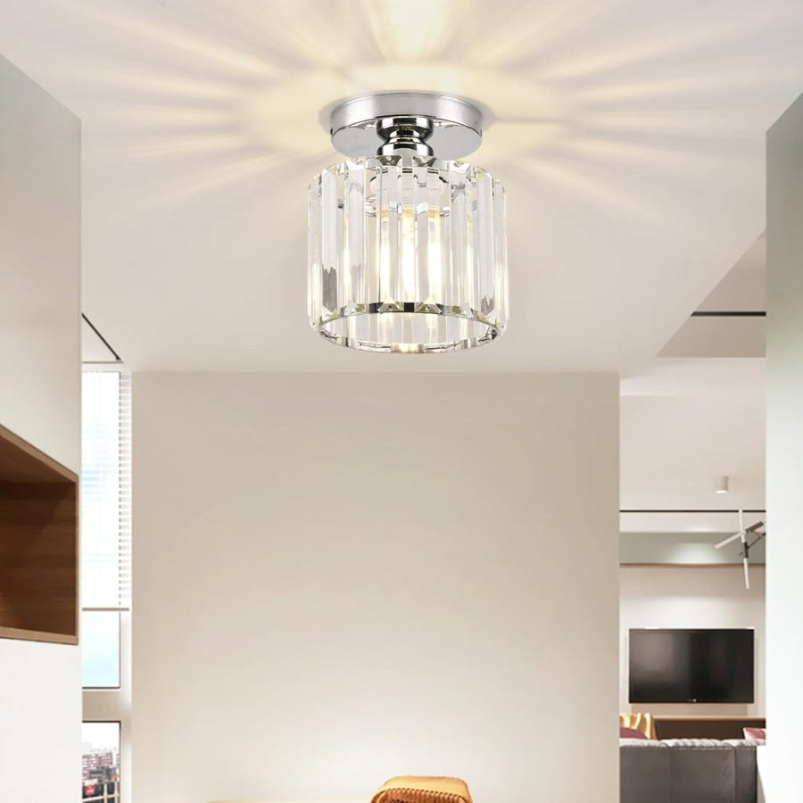Silver ceiling light fixture on a white ceiling