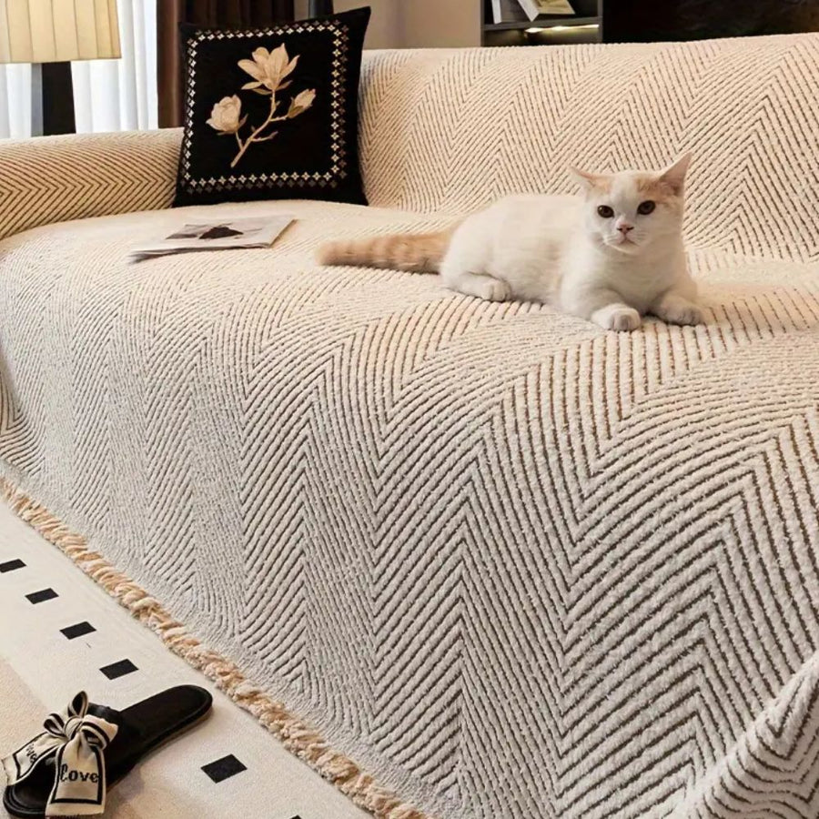 Striped textured sofa cover draped over a sofa