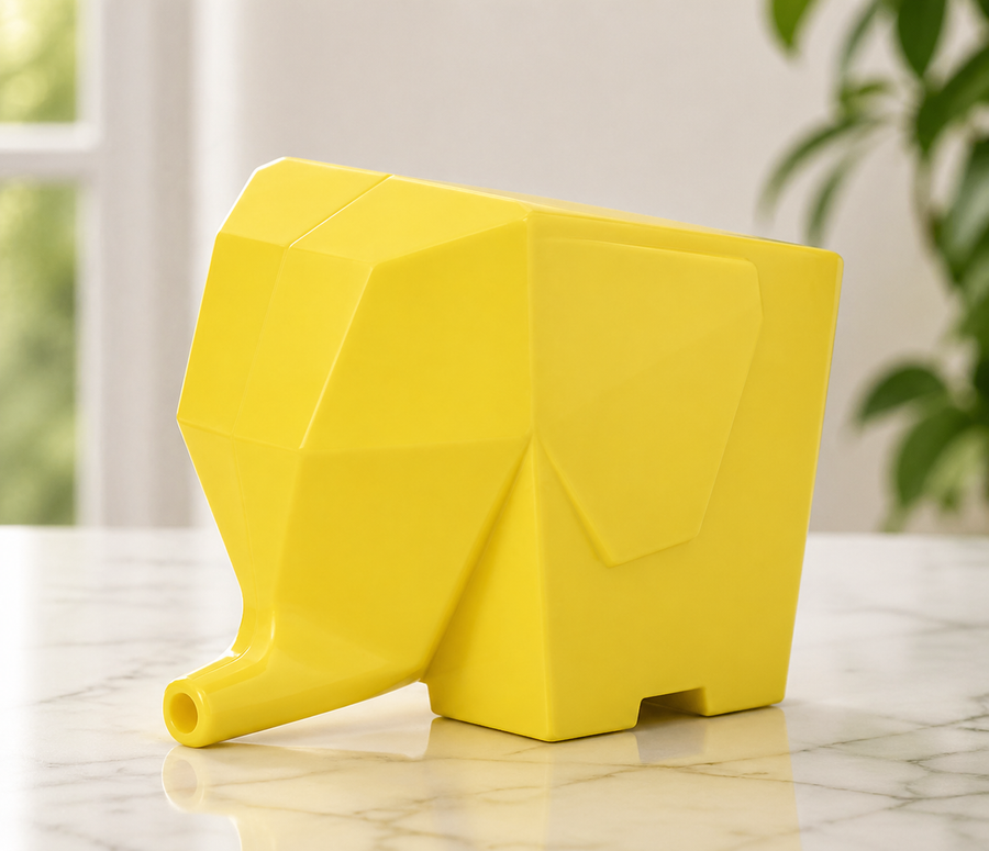 Elephant-shaped rack draining dishes by the kitchen sink.