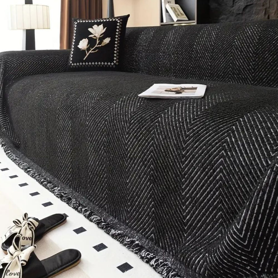 Folded striped textured sofa cover on a table