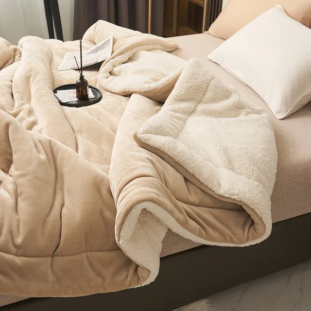Blanket draped over the arm of a couch