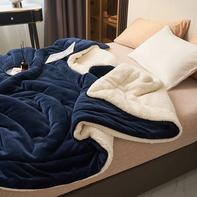 Folded throw blanket showing both color sides