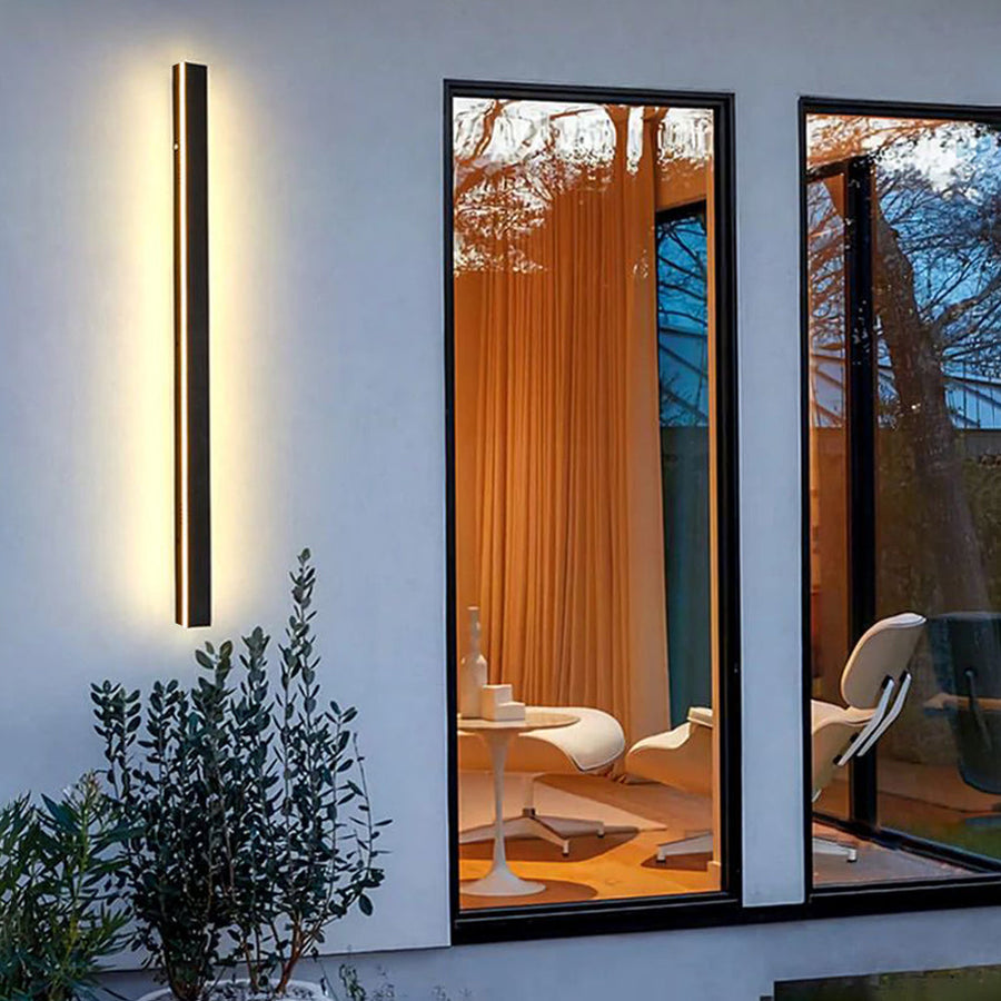 Wall light shown from a low angle against the night sky