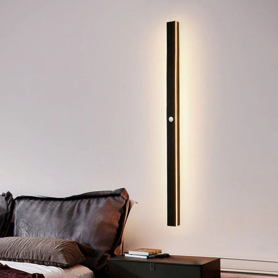 Wall light illuminating a patio seating area