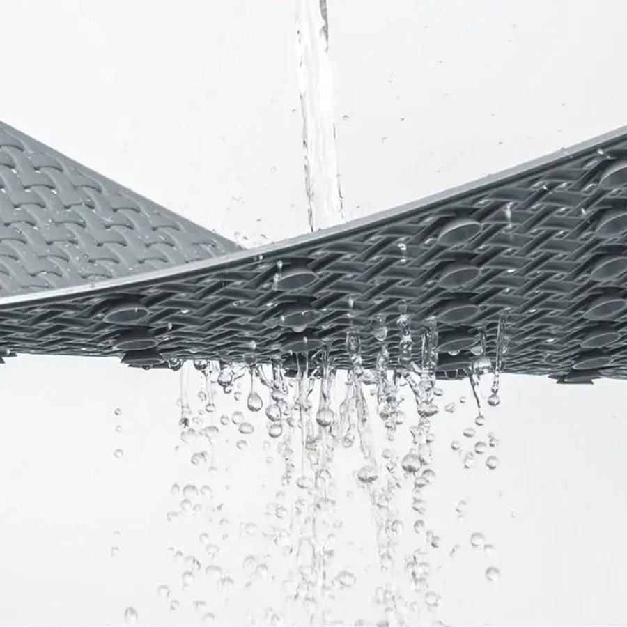 Close-up of the textured surface of a non-slip shower mat