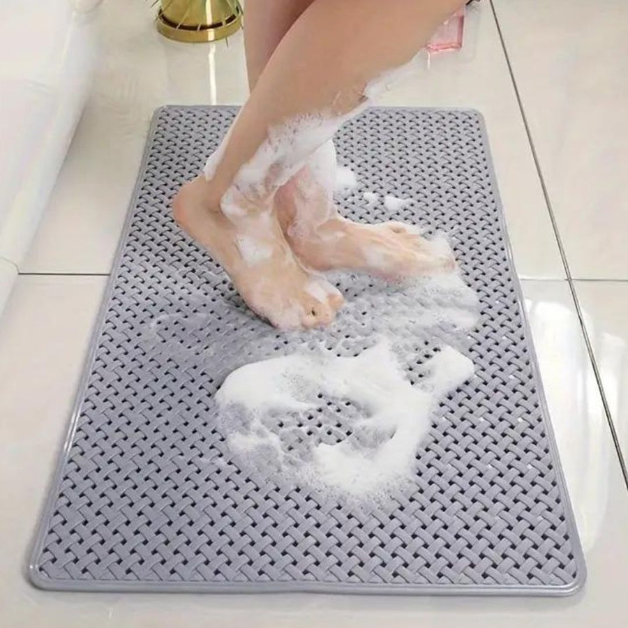 Shower mat placed inside a bathtub for slip protection