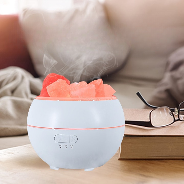 3-in-1 aroma diffuser with salt lamp shown in a living room setting