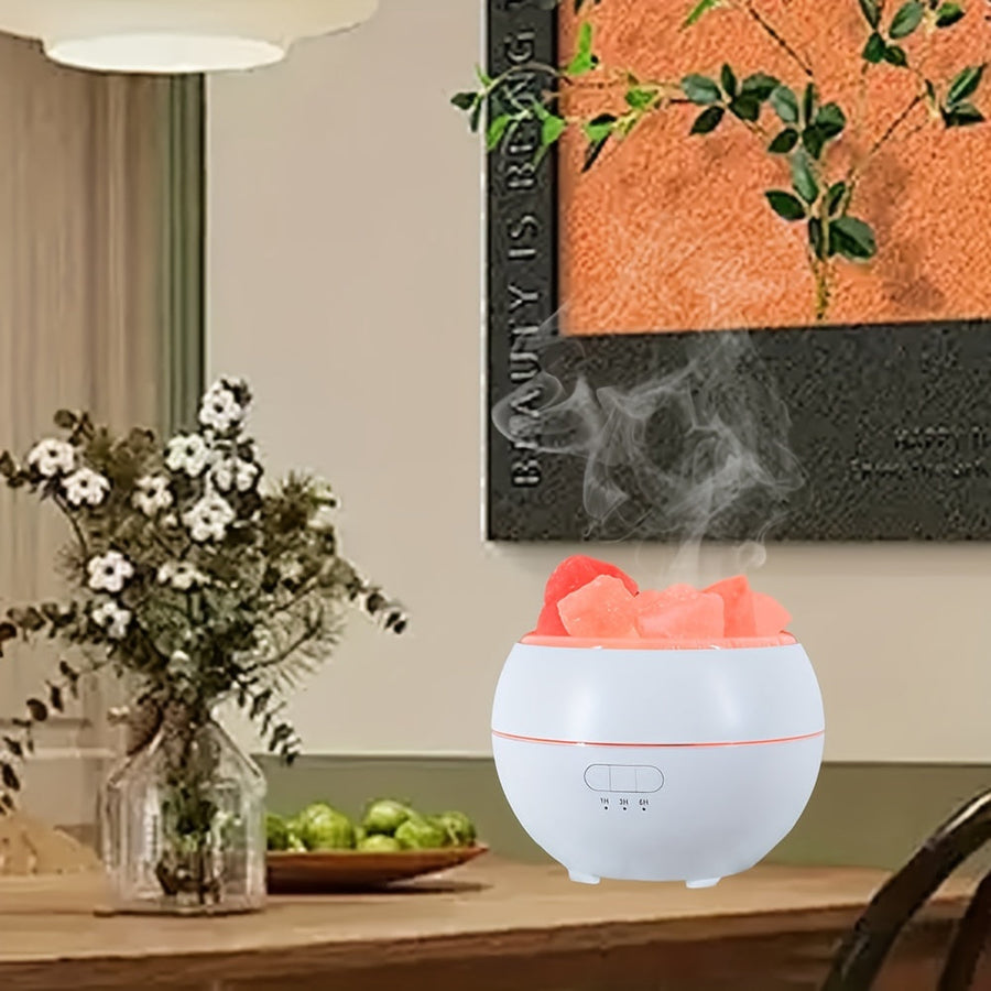 3-in-1 aroma diffuser with salt lamp lit in a dark room