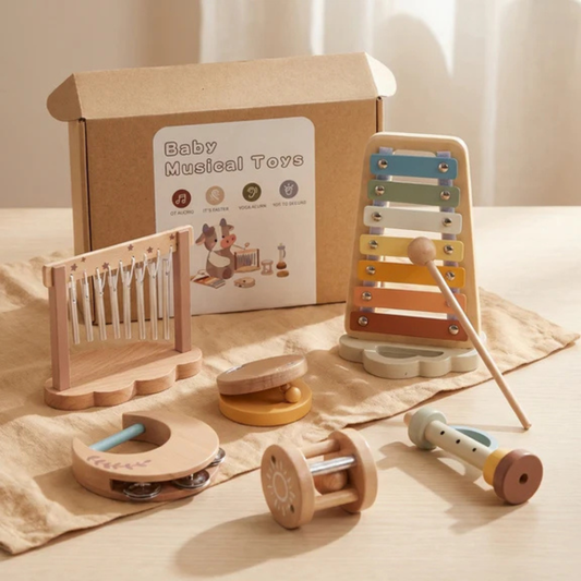 Wooden baby toy set with six rattle pieces on a white background