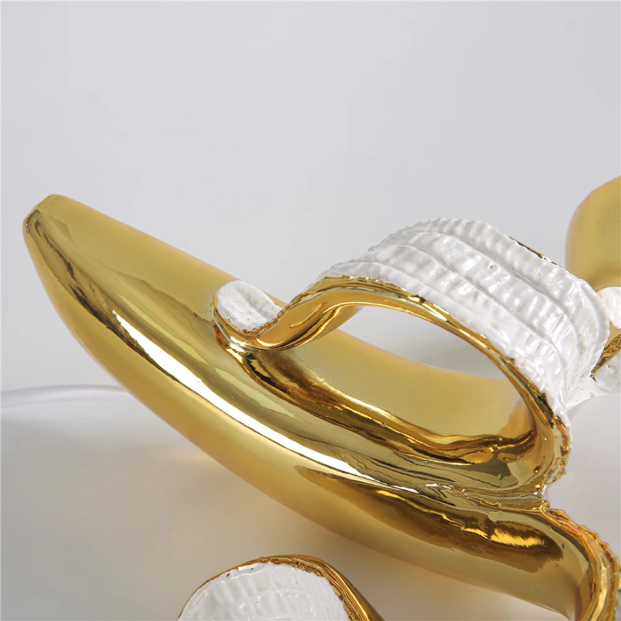 Banana table lamp placed on a living room side table