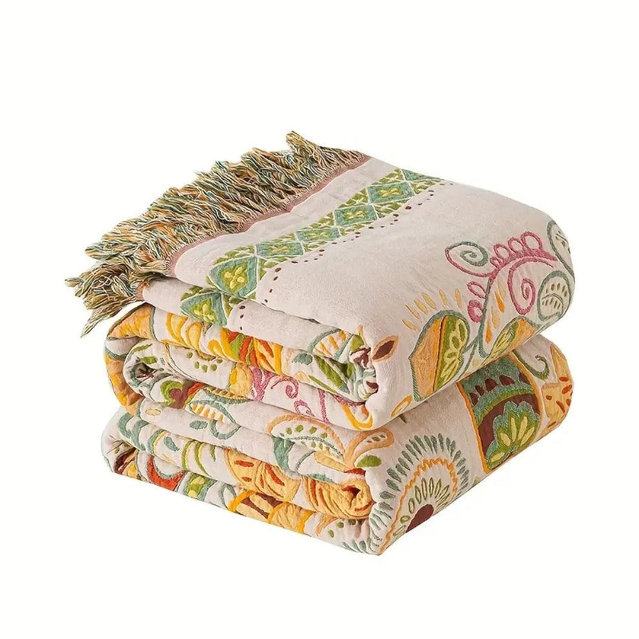 Washable boho throw blanket shown in multiple colors