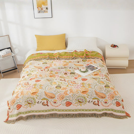 Washable boho throw blanket draped on a sofa
