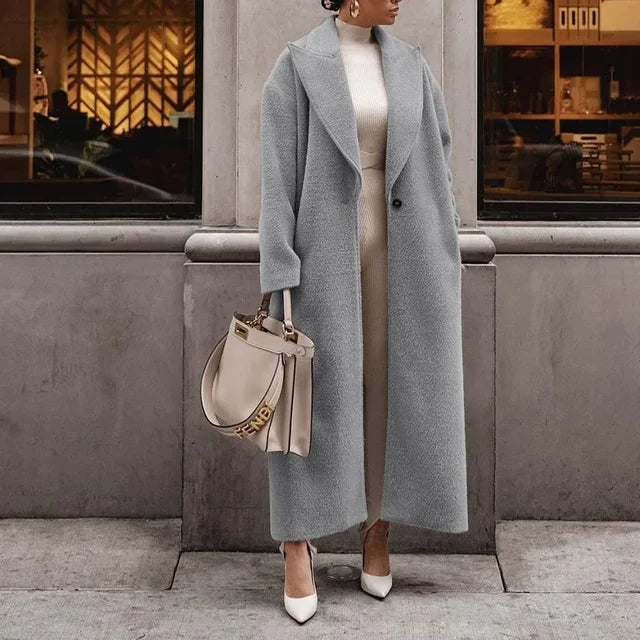 Close-up detail of a women's oversized coat for everyday wear