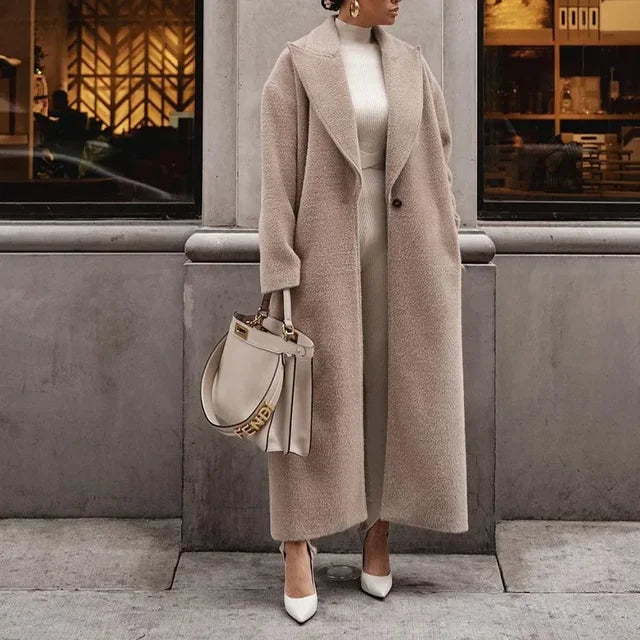 Close-up of the classic oversized women's coat fabric and collar