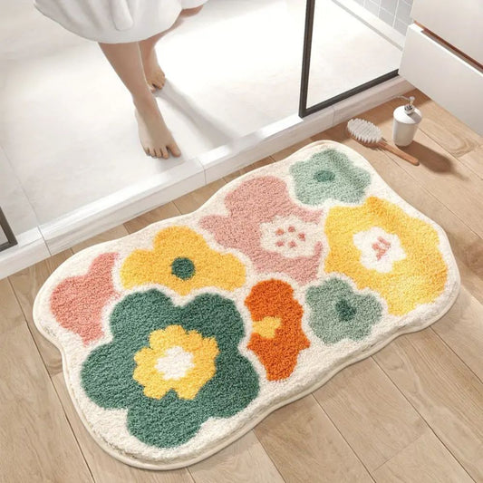 Non-slip floral bath mat laid on a bathroom floor