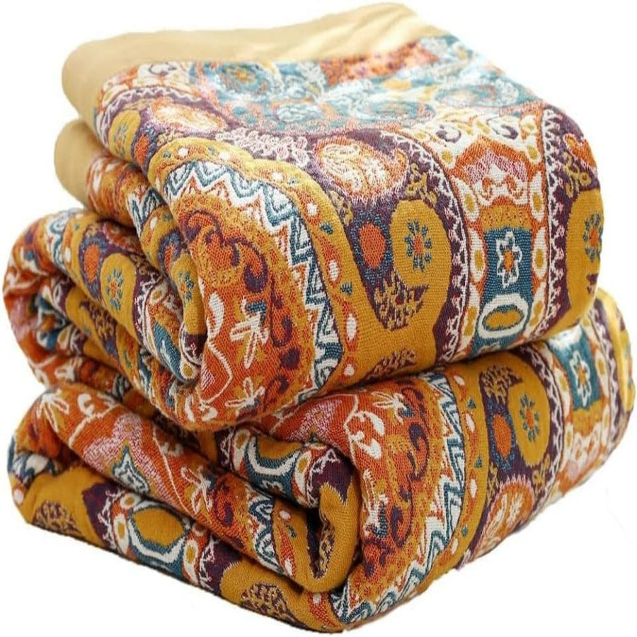 Reversible boho throw blanket folded neatly