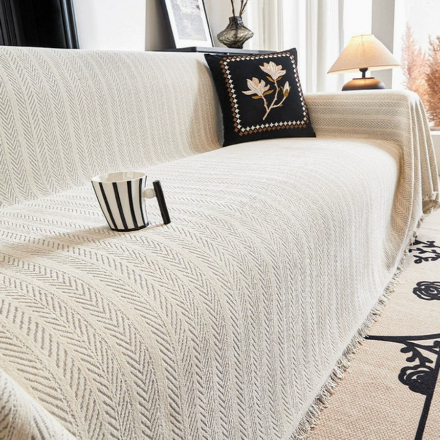 Textured modern sofa cover shown in a living room setting