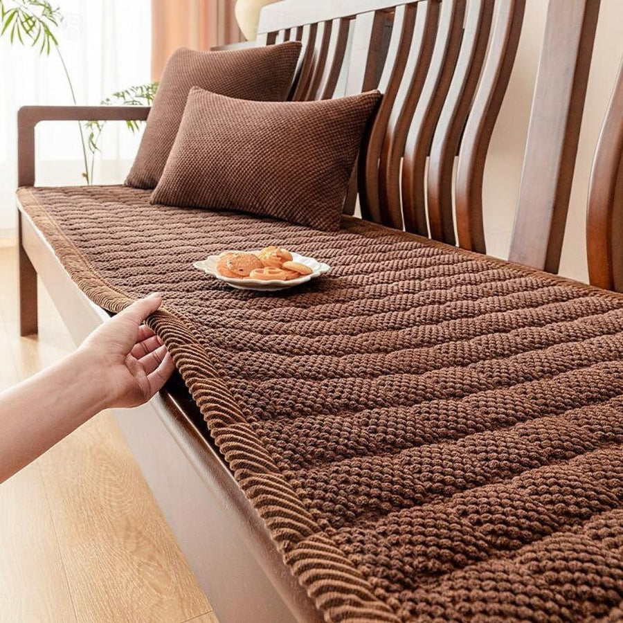 Textured sofa cover folded neatly