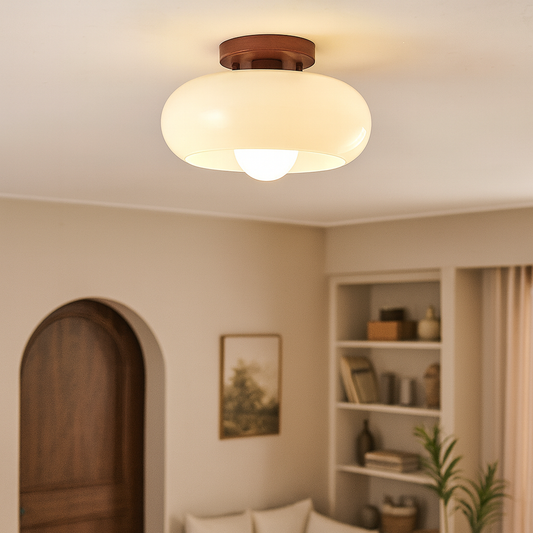 Modern industrial LED ceiling lamp hanging above a table