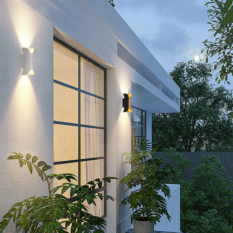 Wall light shown in white finish on an exterior wall