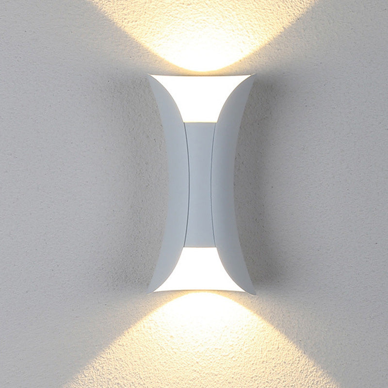 Close-up of the curved outdoor wall light fixture